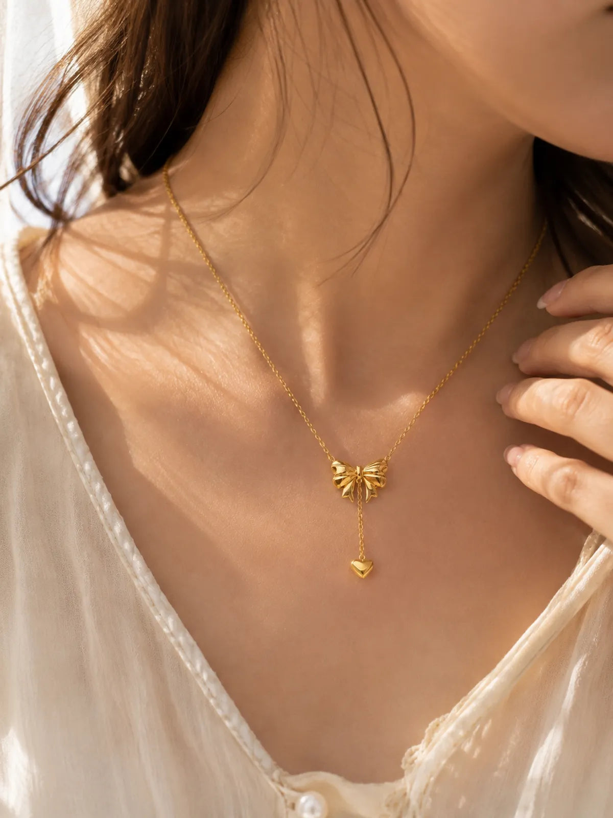 Beau bow drop pendant