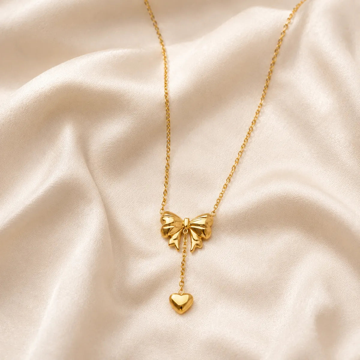 Beau bow drop pendant